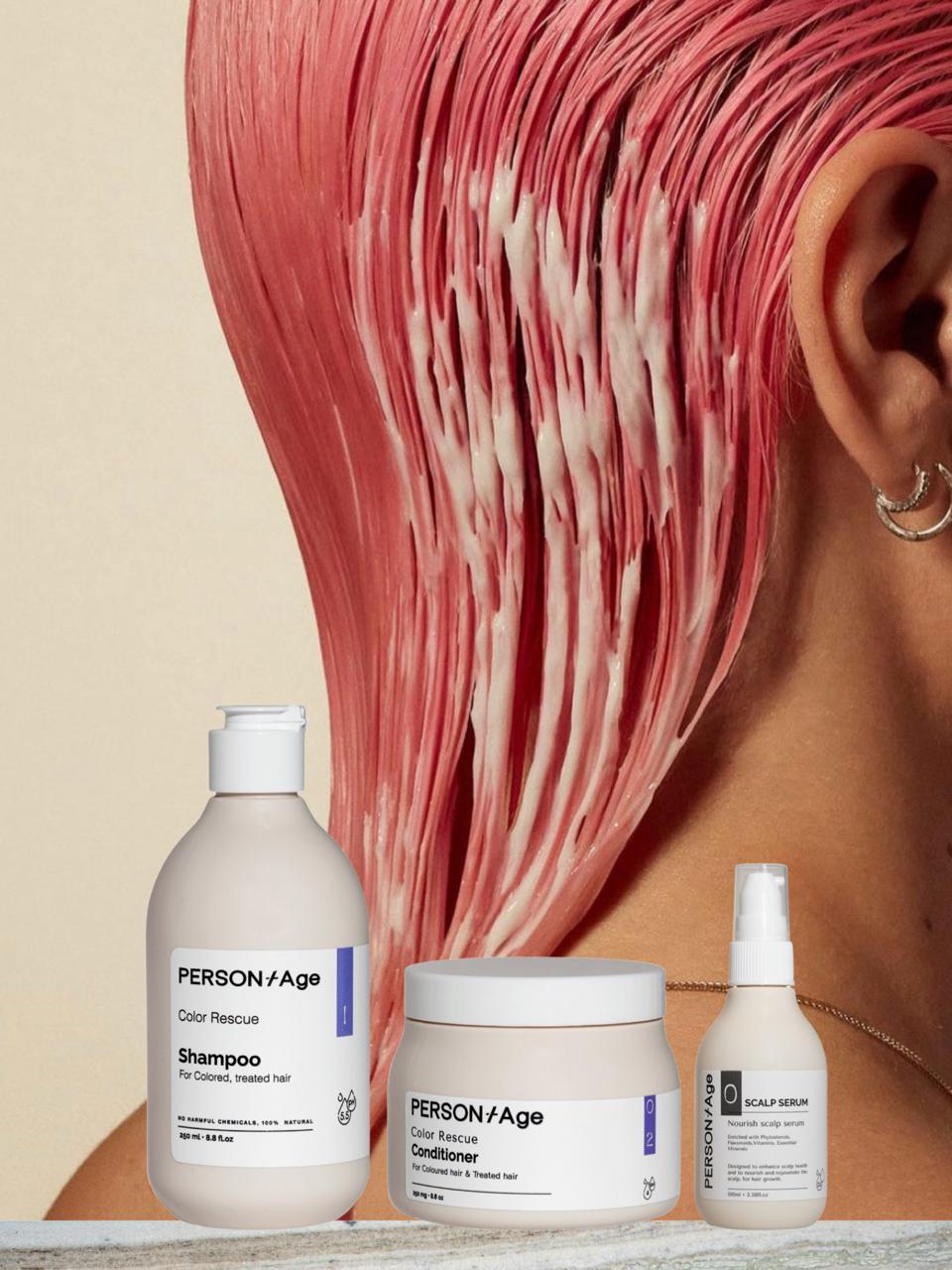 PersonAge  COLOURED HAIR Help Ritual kit -hair care products with a person with pink hair in the background
