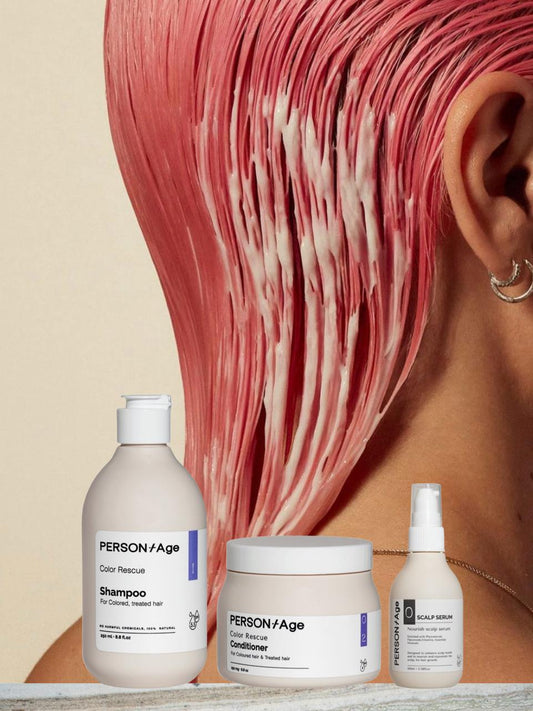 PersonAge  COLOURED HAIR Help Ritual kit -hair care products with a person with pink hair in the background
