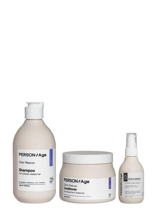 Set of PERSON/AGE COLOURED HAIR Help Ritual kit hair care products including shampoo, conditioner, and serum on a white background.