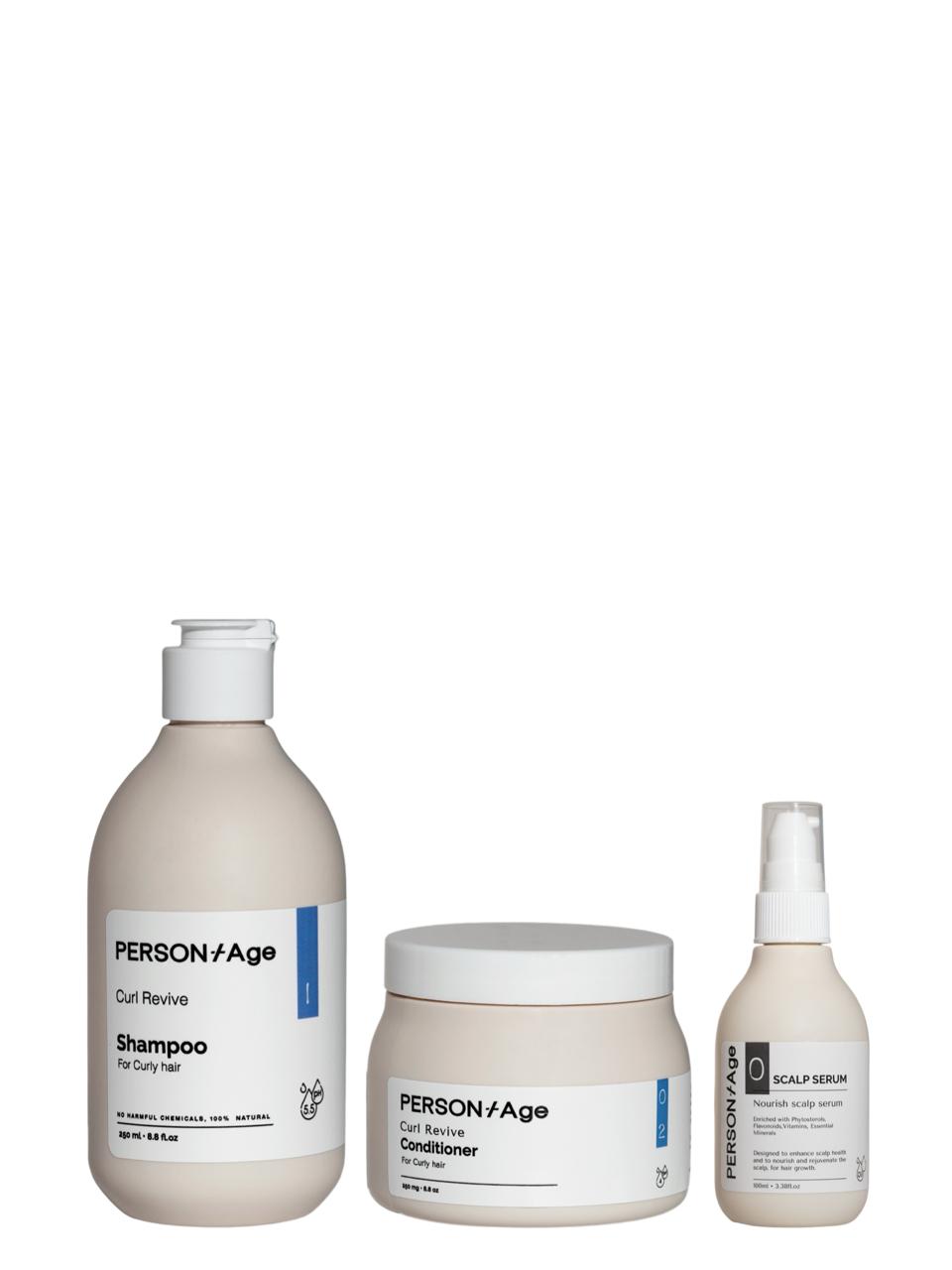 PersontAge CURL CARE & NOURISHMENT Ritual kit hair care product set including shampoo, conditioner, and serum on a white background