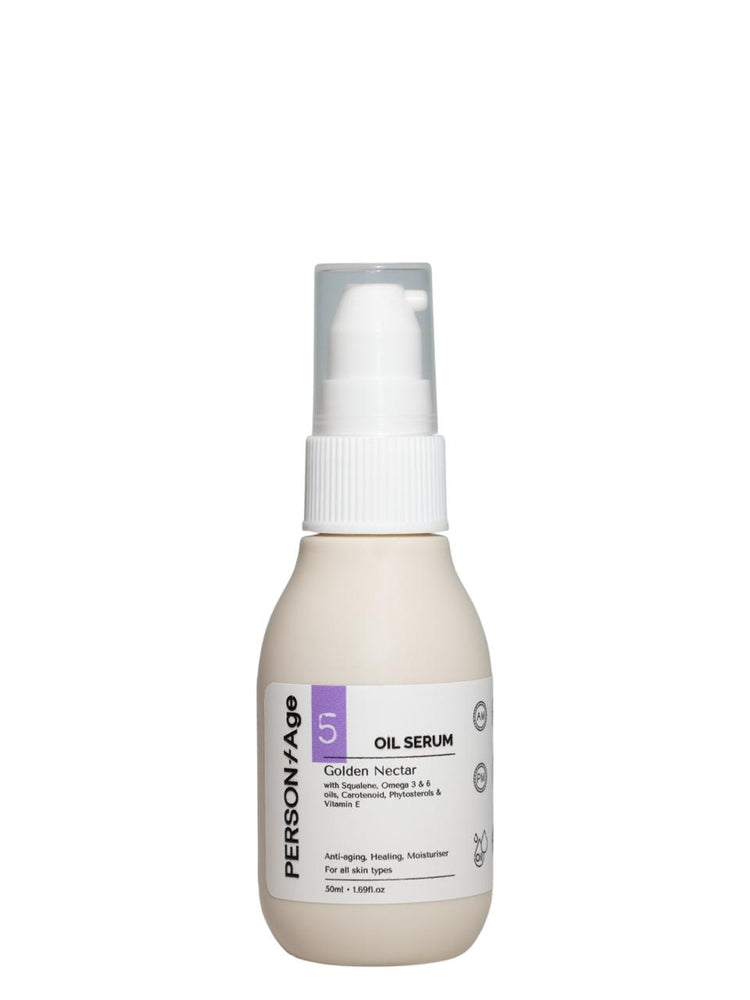Skincare serum bottle labeled 'PersontAge GOLDEN NECTAR on a white background