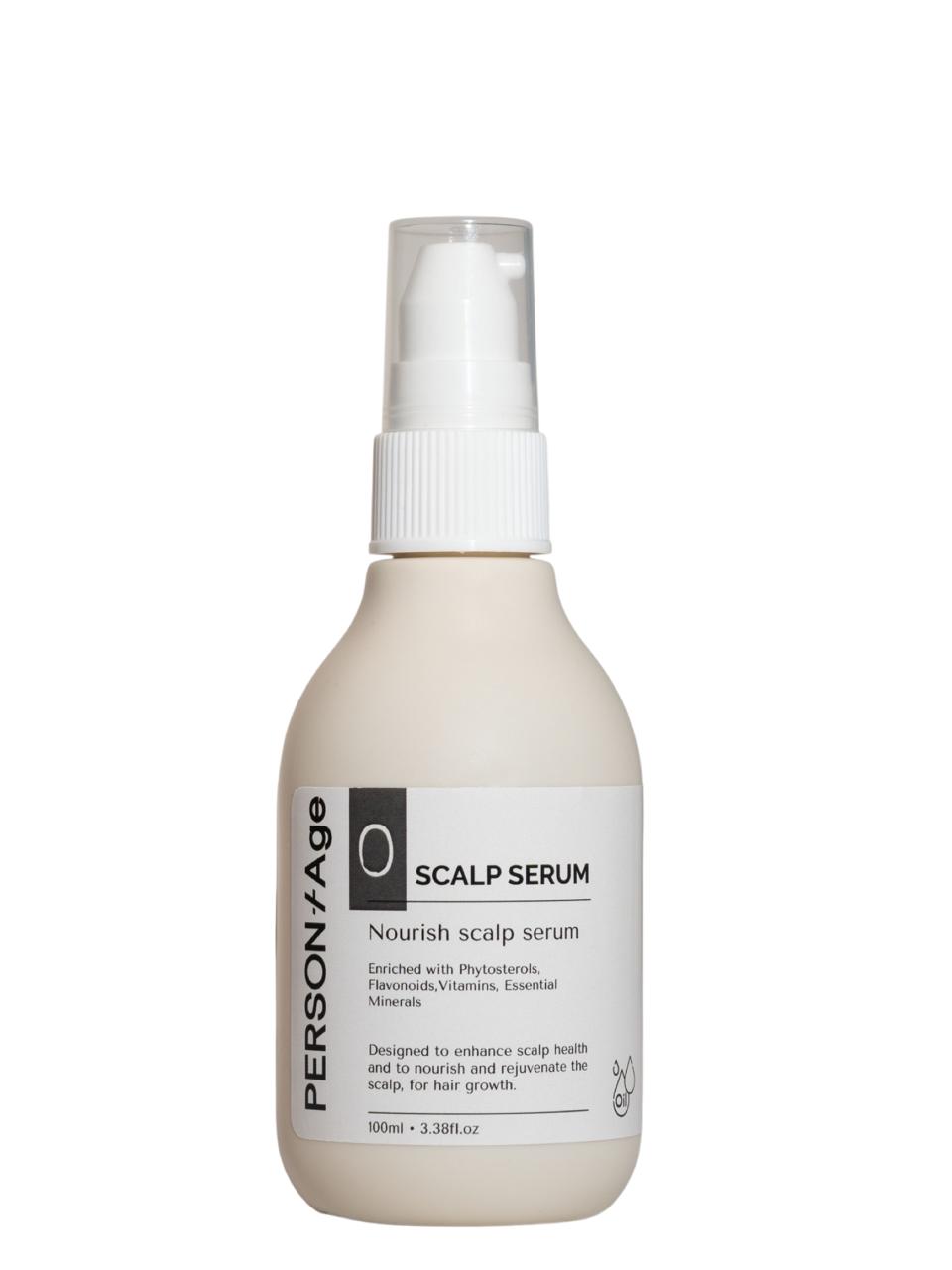 Bottle of PersontAge Scalp Serum on a white background
